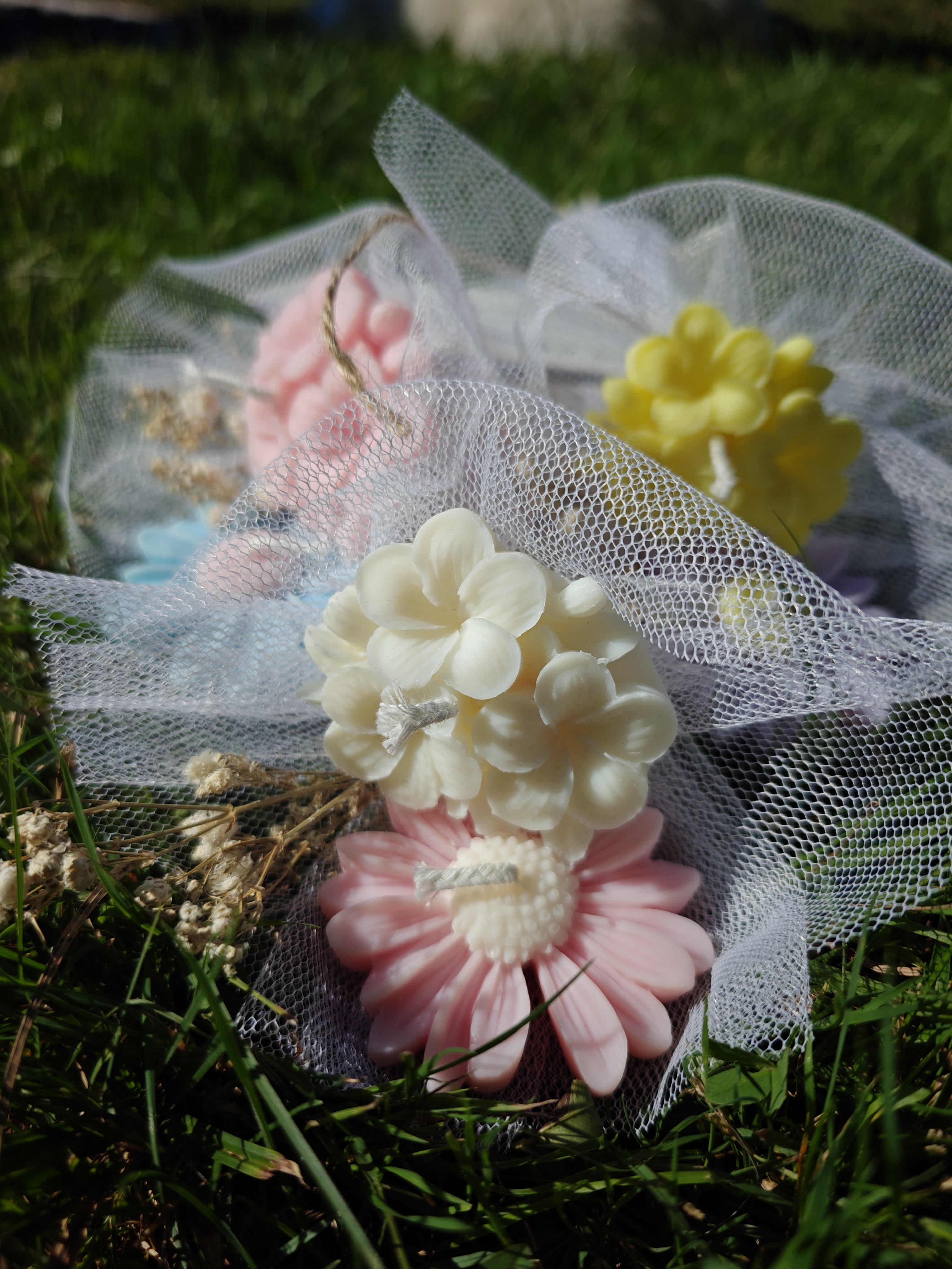 Bouquets de bougies en forme de fleurs